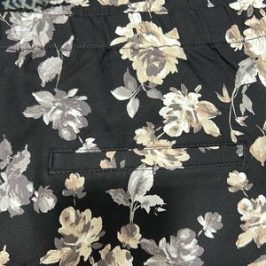 NWOT IM live black and floral slacks